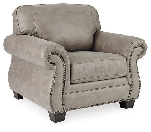 Front view of the Olsberg chair with steel gray upholstery, nailhead trim, and modern roll arm design for classic style.